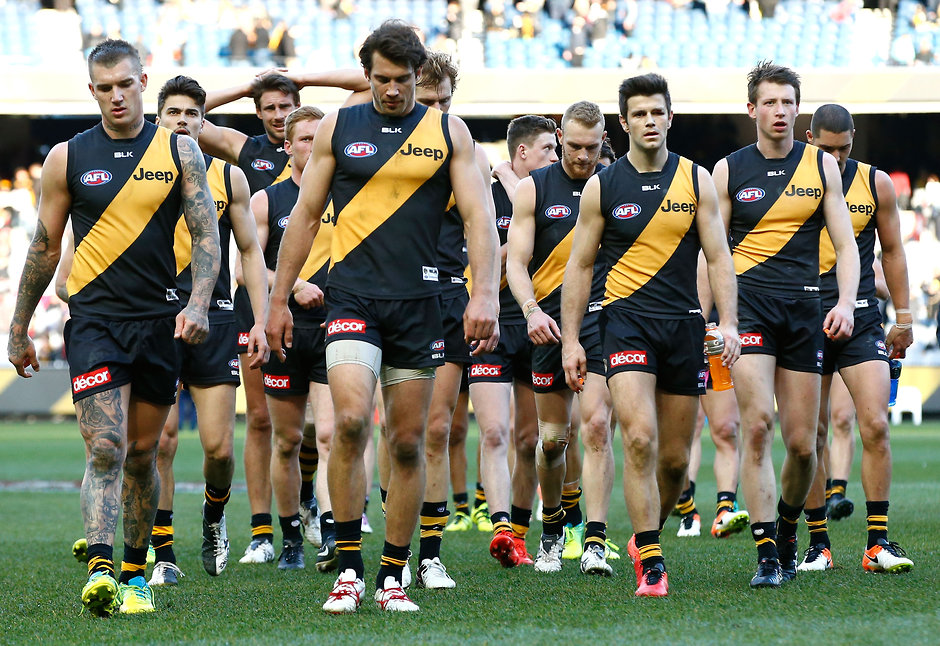 AFL 2016 Rd 22 - Richmond v St Kilda MELBOURNE, AUSTRALIA - AUGUST 20: Tigers players look dejected after a loss during the 2016 AFL Round 22 match between the Richmond Tigers and the St Kilda Saints at the Melbourne Cricket Ground on August 20, 2016 in Melbourne, Australia. (Photo by Adam Trafford/AFL Media)